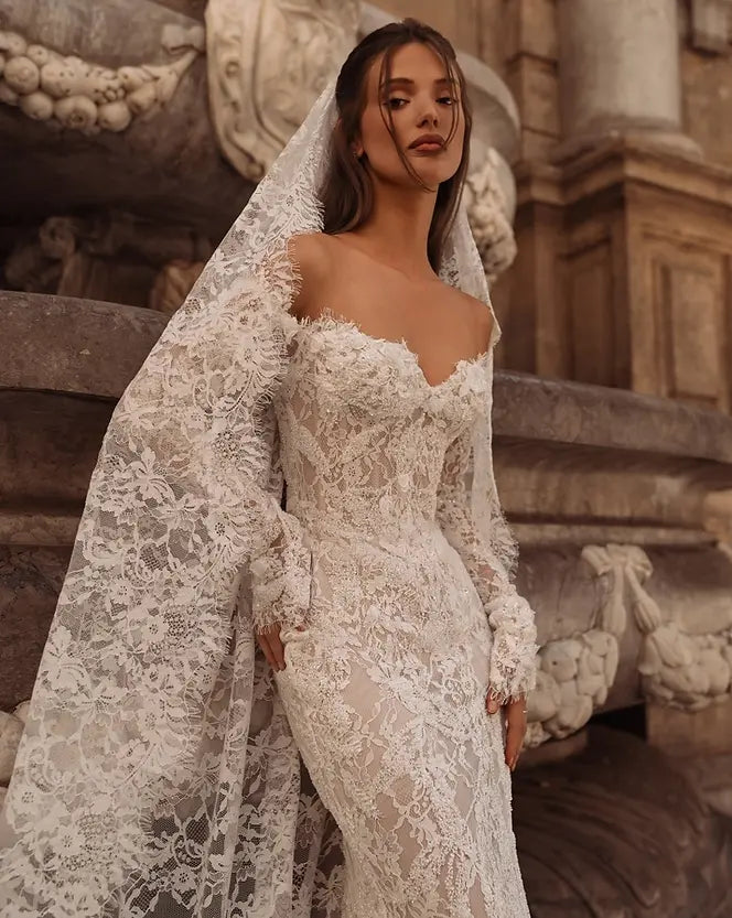 Bride in a designer lace gown